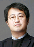 도로는 좁히고, 주차장에는 나무를 심자